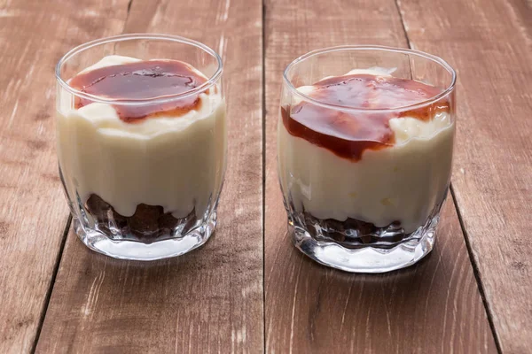 Yogurt with jam and cornflakes with chocolate.