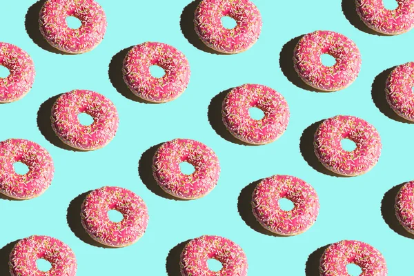 Donuts Auf Hellem Hintergrund Leuchtende Collage — Stockfoto