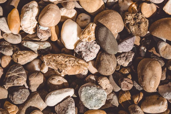 Pebbles. Smooth river stones.