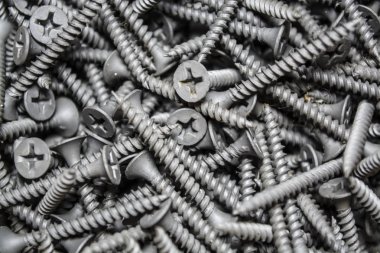 Doku. Arka plan. Gri renk. Bu aynı yeni çivi ortalama büyüklükte bir sürü var. İnşaat malzemeleri. Onarım.