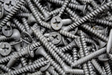 Doku. Arka plan. Gri renk. Bu aynı yeni çivi ortalama büyüklükte bir sürü var. İnşaat malzemeleri. Onarım.