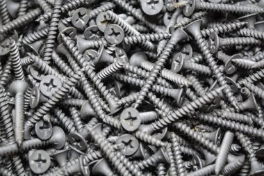 Doku. Arka plan. Gri renk. Bu aynı yeni çivi ortalama büyüklükte bir sürü var. İnşaat malzemeleri. Onarım.