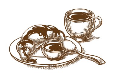 Bir fincan kahve ve kruvasanla kahvaltı.
