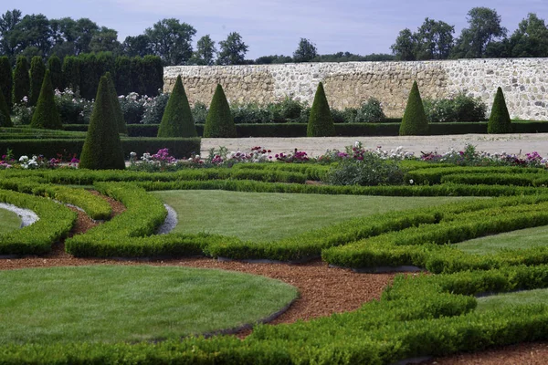 The castle garden with symmetrically shrunken bushes