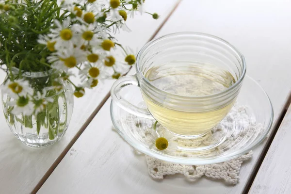 Herb tea and chamomile flowers picked in the garden.