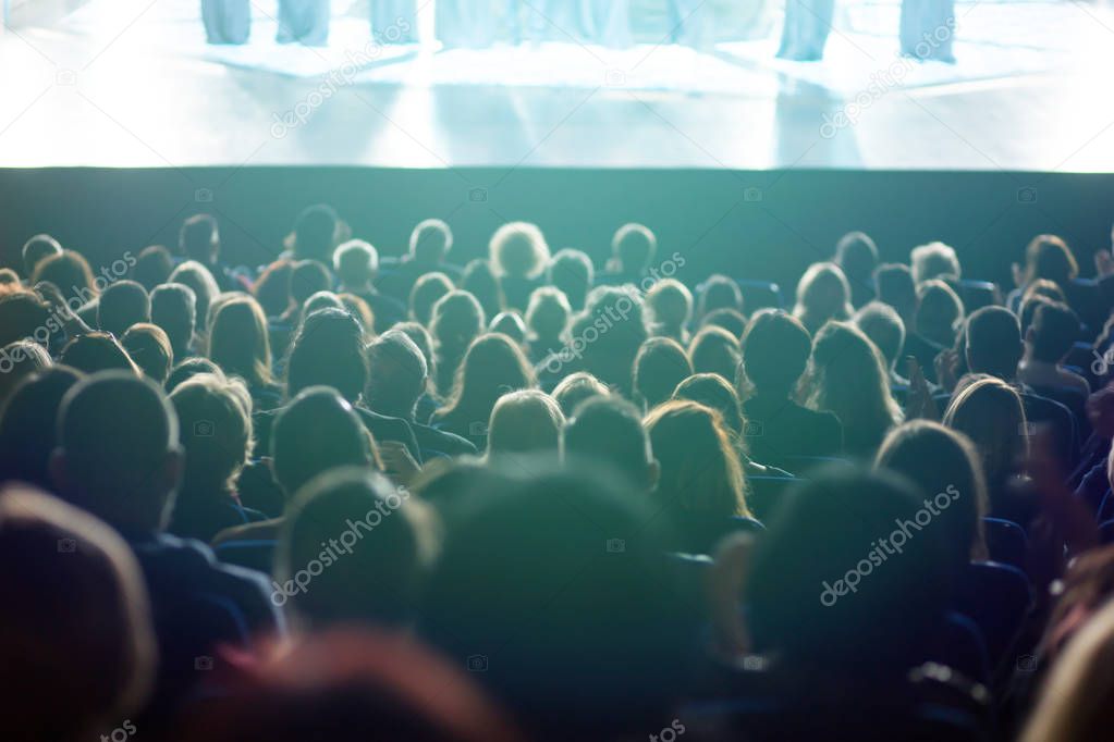 theater audience watching a performance