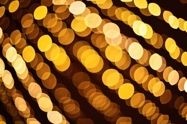 Jul gyllene bokeh ljus bakgrund. Oskärpa julgran dekoration bakgrund — Stockfoto