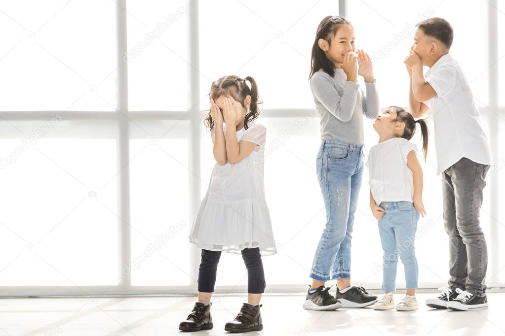 Kids bully to friend, concept for bullying among group of children when they live together out of parents' eyes in school or private time.