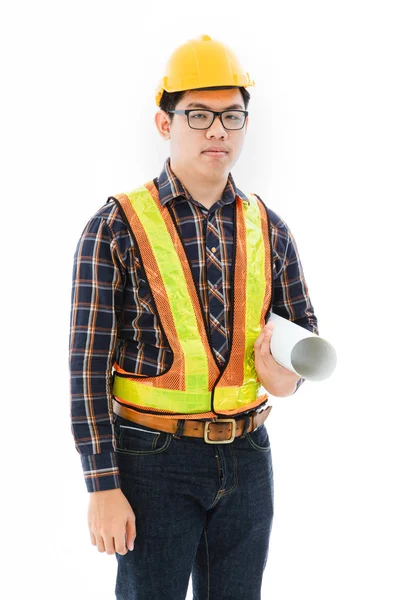 Інженер чоловік стоїть жовтий шолом — стокове фото