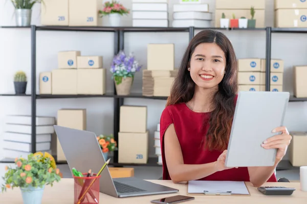 Young lady working at home office