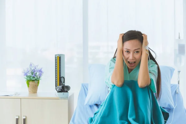 Female patient shows despair with her illness.