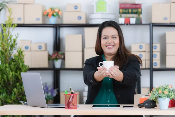 plump lady in startup office