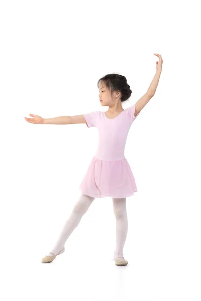 Pink dressed Asian girl in a ballet pose — Stock Photo, Image