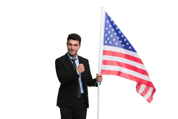 Podnikatel držící americkou vlajku — Stock fotografie