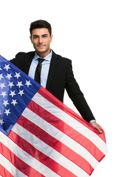 Caucasian businessman holding America flag — Stock Photo, Image