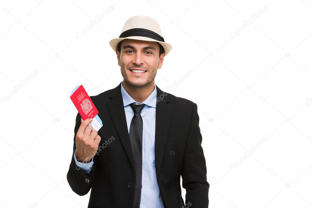 Caucasian businessman holding passport