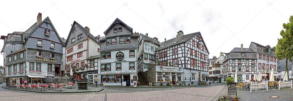 Panorama of town square with timber-framed buildings in Monschau, Germany