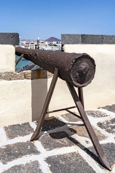 An old cannon on the old fortress (Castillo de San Gabriel), off the coast from Arrecife, Lanzarote, Spain