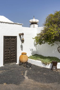 Details of one of the many beautiful white-washed houses on the island of Lanzarote, Spain