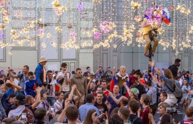 2018 FIFA World Cup Russia. Football fans of different countries celebrate the victory of the Russian team over Spain at Nicholas Street in Moscow/