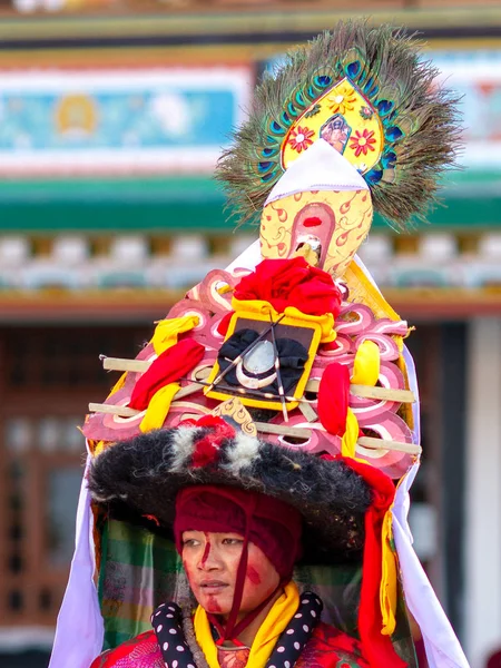 Lama in ritual costume and ornate hat performs Black Hat Dance o — Stock Photo, Image