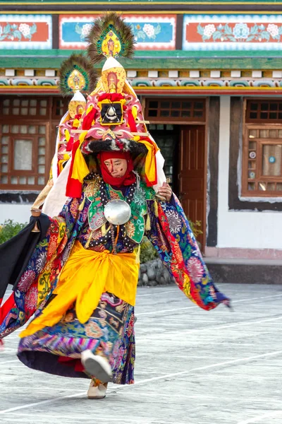 Lama in ritual costume and ornate hat performs Black Hat Dance o — Stock Photo, Image