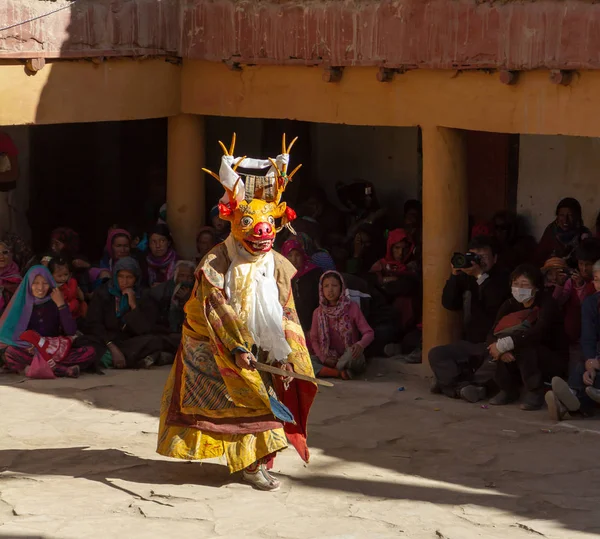 Monk in deer mask with sword performs religious mystery dance of — Stock Photo, Image