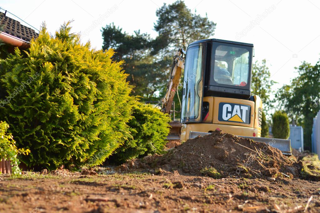 Yellow caterpillar excavator, construstion work 