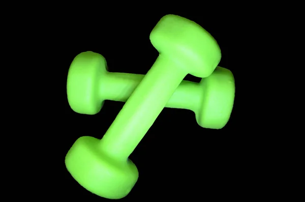 Neon Dumbbells Koyu Arka Plan Üzerinde — Stok fotoğraf