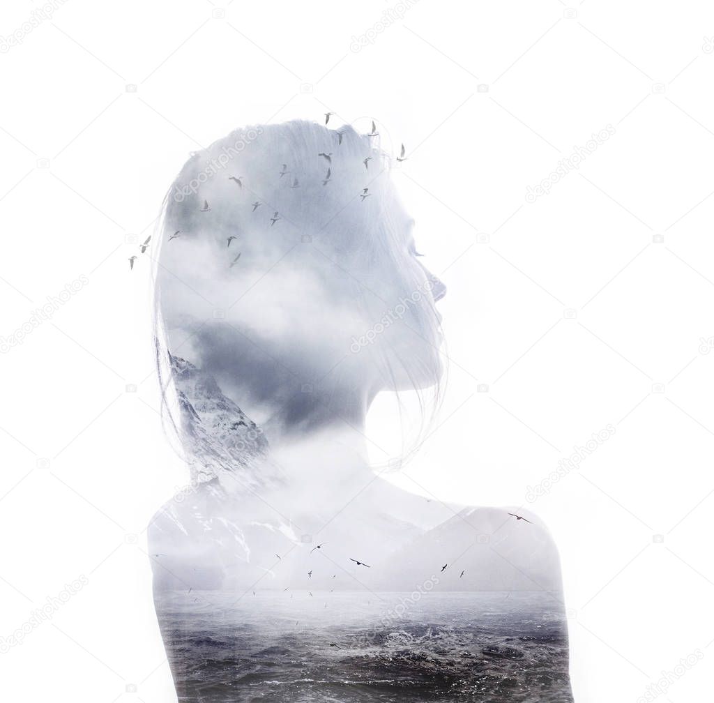 Double exposure portrait of young thoughtful woman with ocean, mountains and flying birds. 