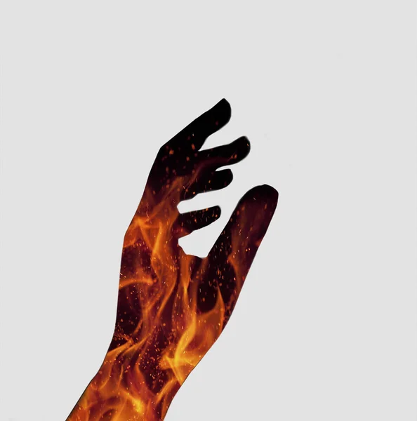 Dubbel Exponering Effekt Silhuetten Hand Med Eld Brinnande — Stockfoto