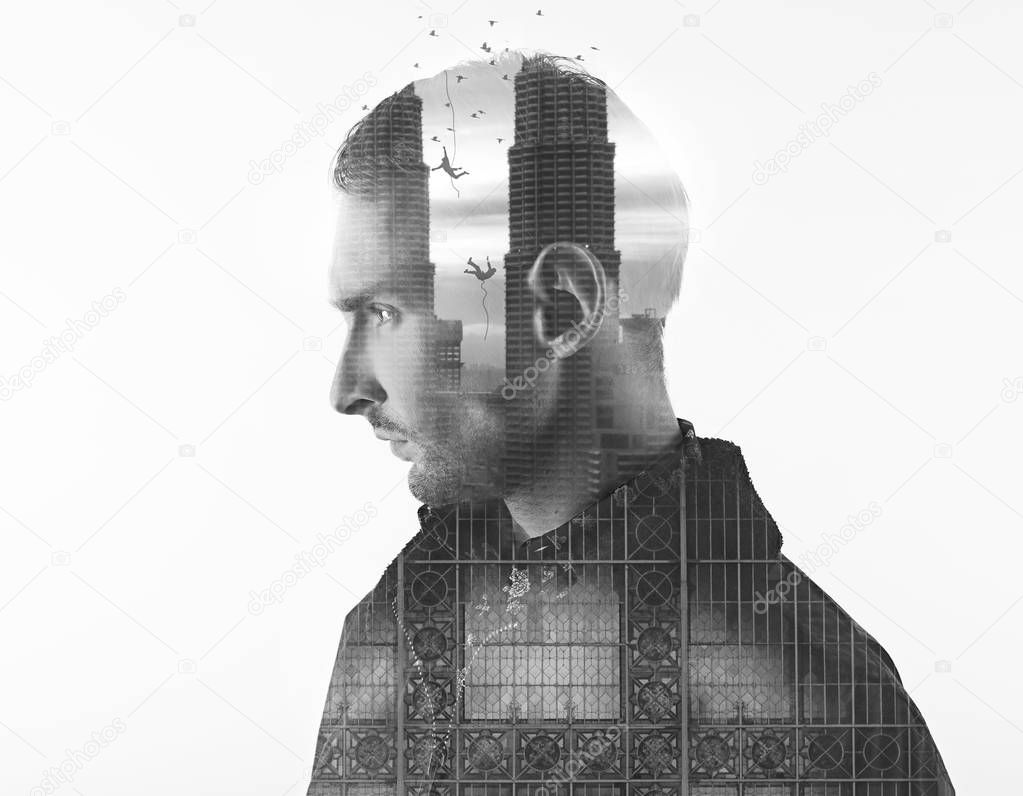 Double exposure portrait of young bearded man head with city skyscrapers and falling person