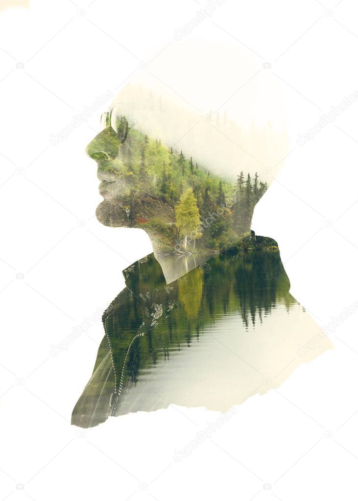 Double exposure silhouette of thoughtful man with green forest landscape in water reflection. 