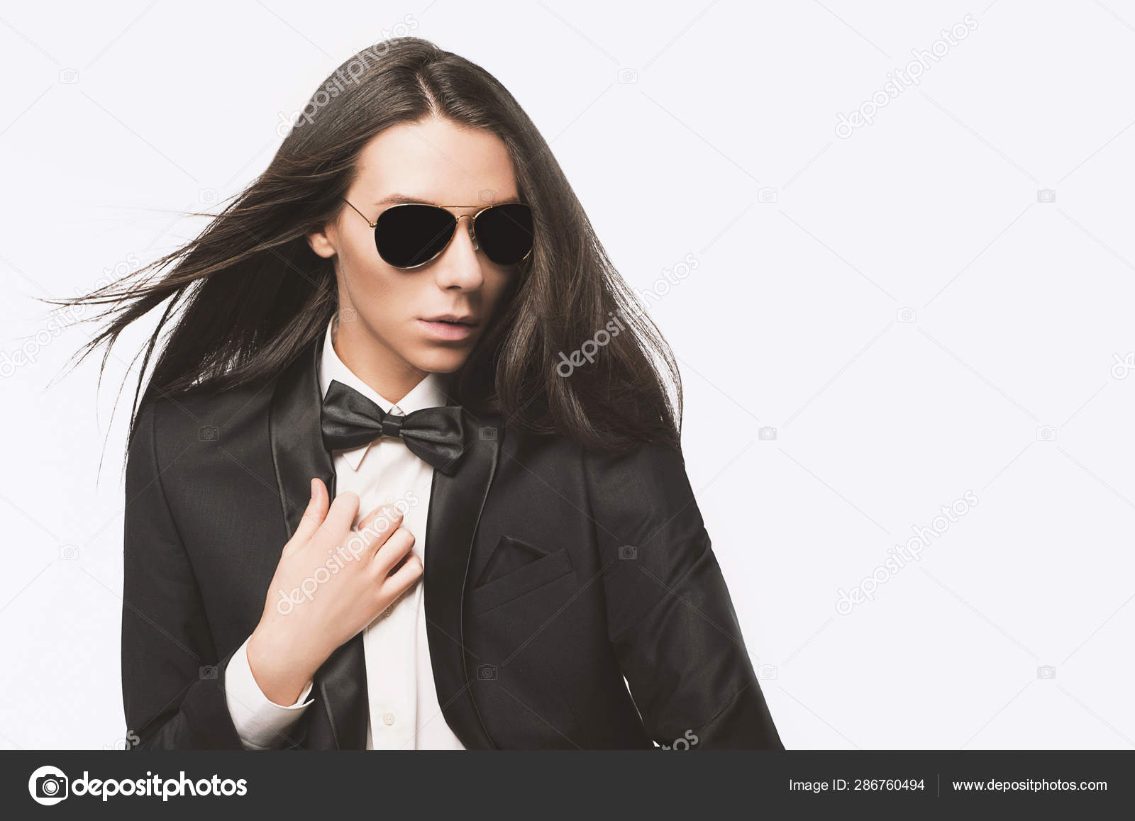 Stylish Attractive Young Man Long Silky Hair Black Suit Bow Stock Photo by  ©Nordbird 286760494