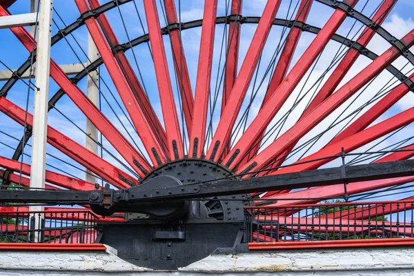 The Laxey Wheel also known as Lady Isabella is built into the hillside above the village of Laxey in the Isle of Man. It is the largest working waterwheel in the world — Stock Photo, Image