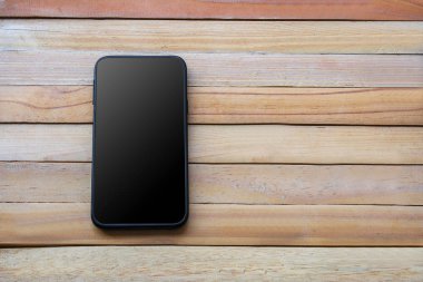 Eğitim için ahşap tahta background.using duvar kağıdı, iş ürün kavramı nesne dijital iletişim kum mesaj veya arama ve kopya alanı görüntü için akıllı telefon