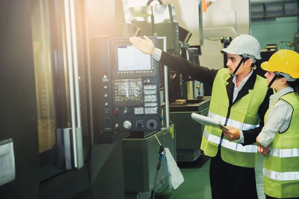 Asian female engineer factory inspection with man business engin — Stock Photo, Image