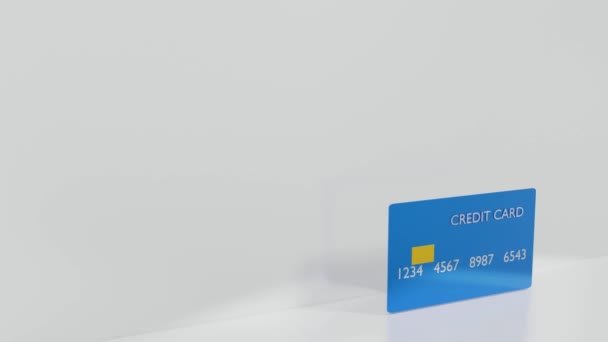 Footage Blank Blue Credit Card Sliding Right Left White Background — Stock Video