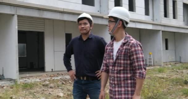 Slow Footage Checking Construction Site Asian Engineers Helmets Walking Construction — Stock Video