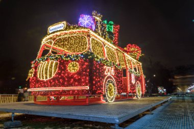 WARSAW, POLAND - JANUARY 25: Bus with gifts - Christmas illumination on 25th January 2017 in Warsaw, Poland.