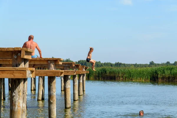 Child Jumping Water — Stock Photo, Image