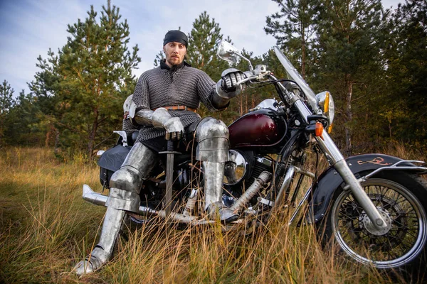 Medieval Warrior Armor Sits Motorcycle Sword His Hands Background Forest — Stock Photo, Image
