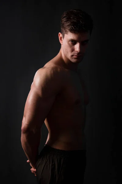 Muscular Bodybuilder Posing Naked Torso Black Background Dark Backlight Sexy Stock Picture
