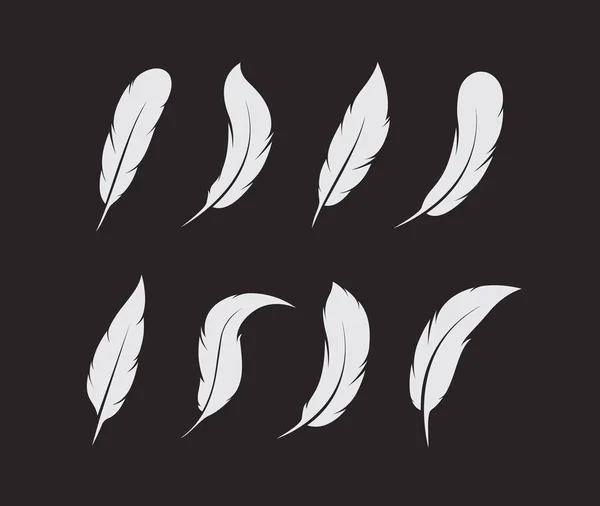 黒の背景に白い羽のベクトル群。アイコン. — ストックベクタ
