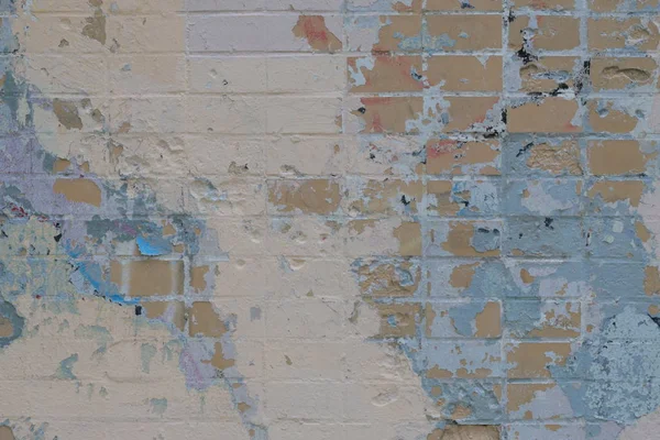 背景の古い剥離石膏テクスチャで色ヴィンテージ レンガの壁 レトロなパターンを持つ抽象的な背景は バナー コピー スペースとモダンな未来的な塗られた壁 — ストック写真