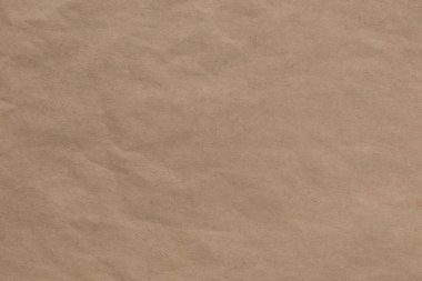Açık kahverengi, arka plan, kraft kağıt arka plan bej dokulu. Zarf kağıt buruşuk. Yatay görüntü