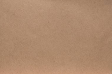 Pastel altın kahverengi arka plan, kraft kağıt arka plan düzeni dokulu. Zarf kağıt. Yatay