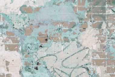 Çizikler, noktalar ve arka plan, doku için çatlaklar ile boyalı tuğla duvar. Eski boya lekeleri ile duvar parçası