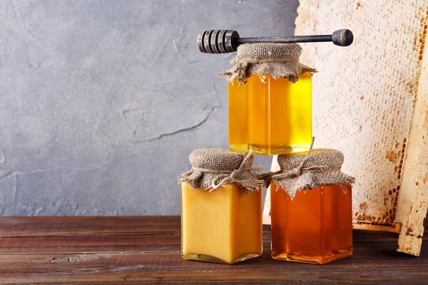 Honey Background Sweet Honey Comb Glass Jar Wooden Background — Fotografia de Stock