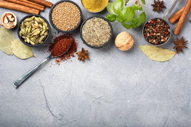 Wooden table of colorful spices. Top view.	